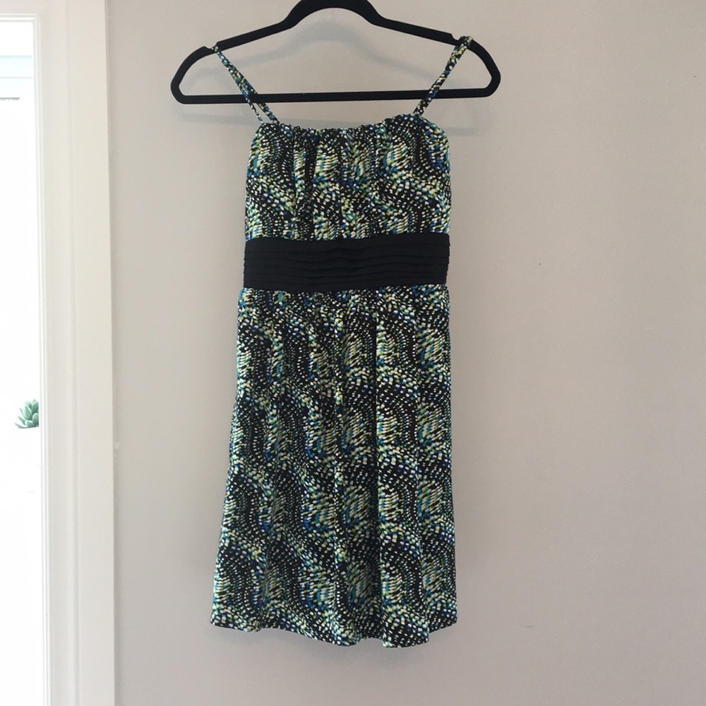 Riki’s green, blue and white dotted dress